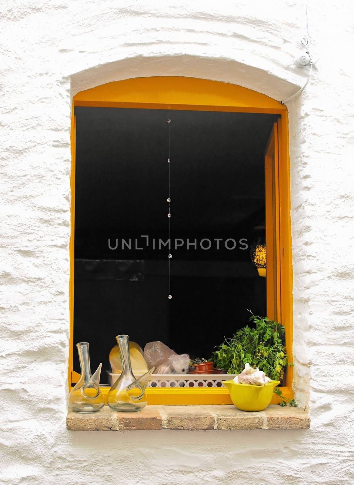 Window in the wall, Cadaques village, Costa Brava, Spain