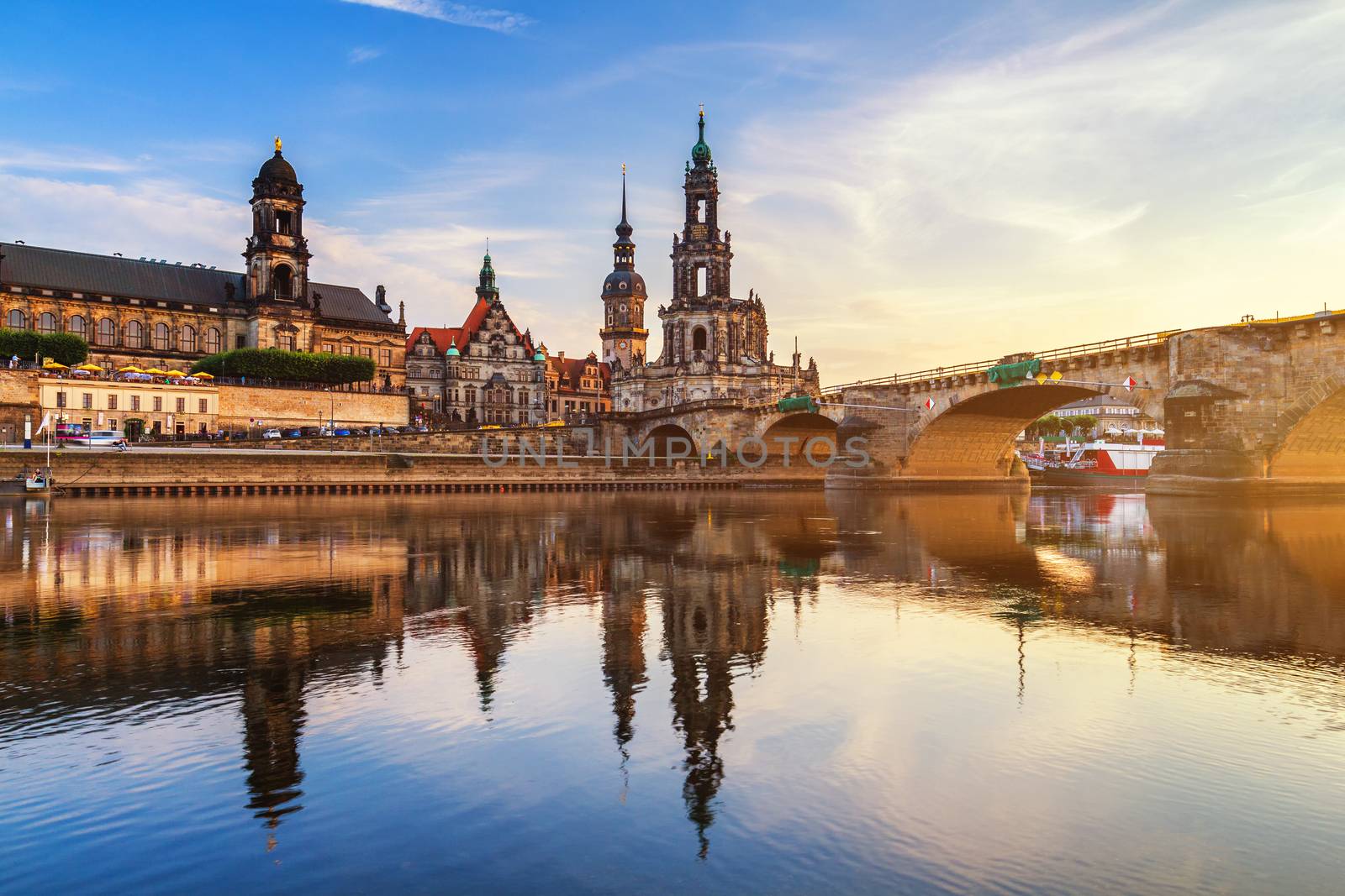 Augustus Bridge (Augustusbrucke) and Cathedral of the Holy Trinity (Hofkirche) over the River Elbe in Dresden, Germany, Saxony.