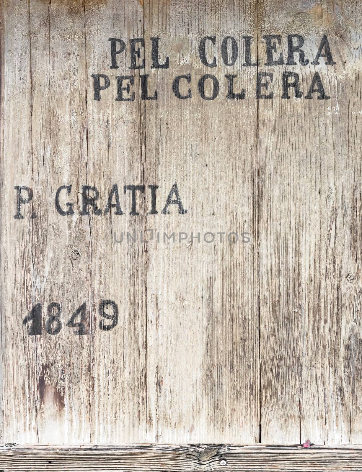 Milan, Italy. Cover of a wooden coffin with a memorial for the cholera's deaths of 1849. (Translation from Italian: for Cholera, pious grace).