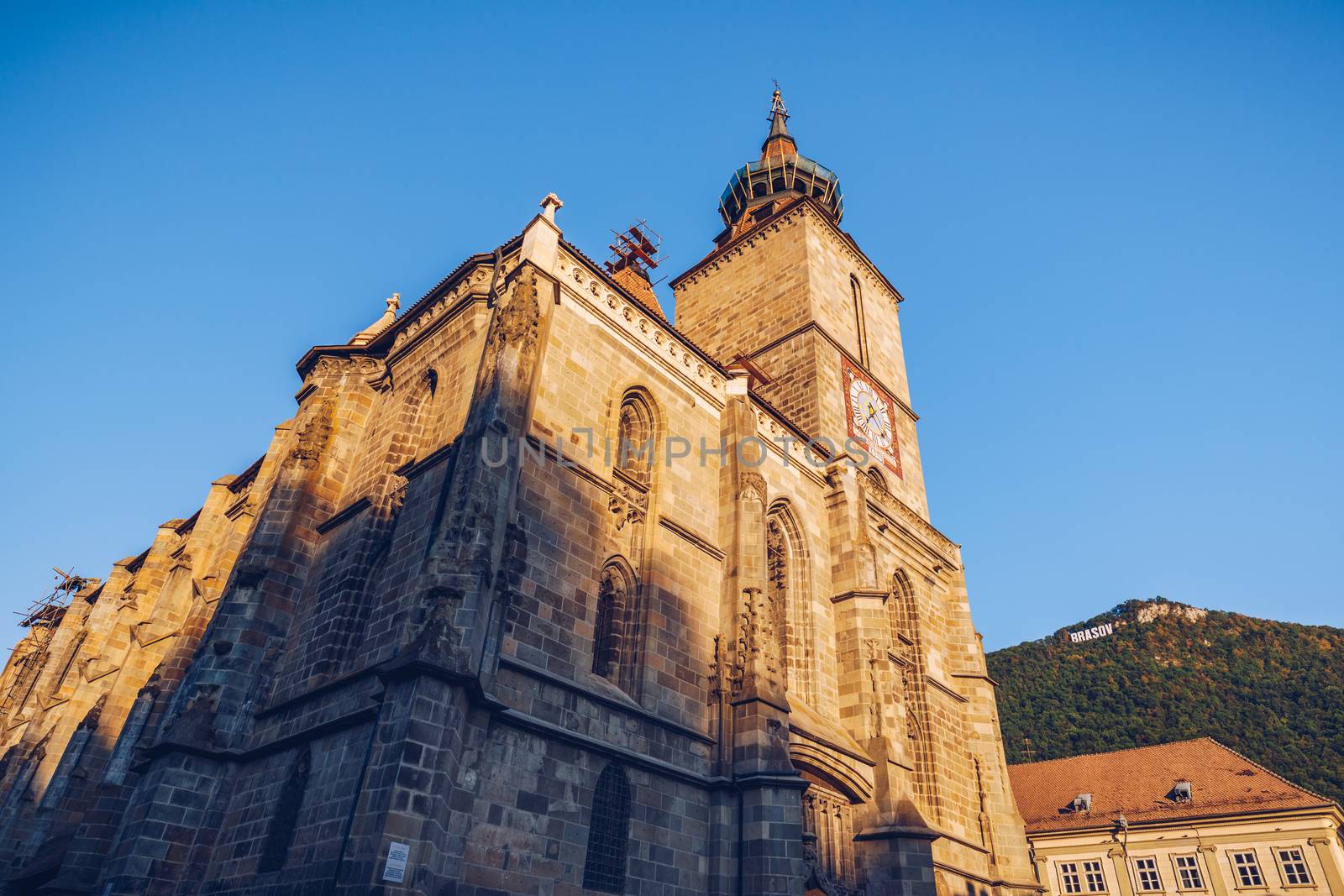 Brasov, Romania. Black Church built in medieval times in Council Square in downtown of Brasov, Transylvania.