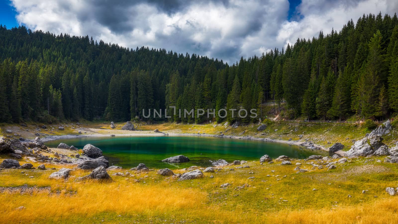 Carezza lake (Lago di Carezza, Karersee) with Mount Latemar, Bolzano province, South tyrol, Italy.