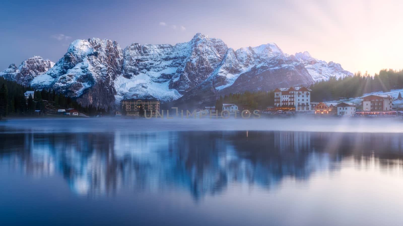 Misurina Lake, on Dolomites (Italian Alps) seen at sunrise. Sorapiss mountain in the background. South Tyrol, Dolomites, Italy.