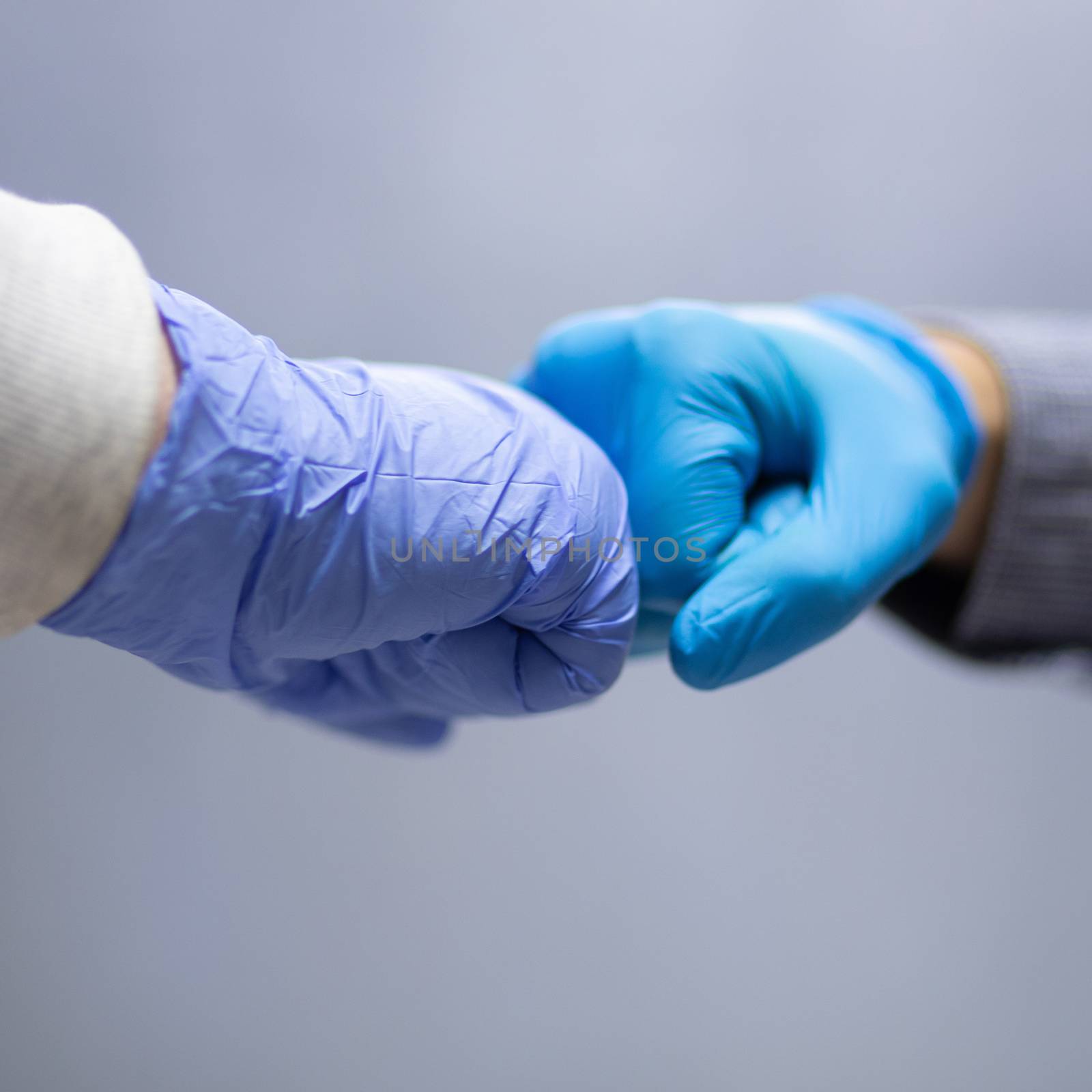 Fist bump greeting! stock photo by adamr