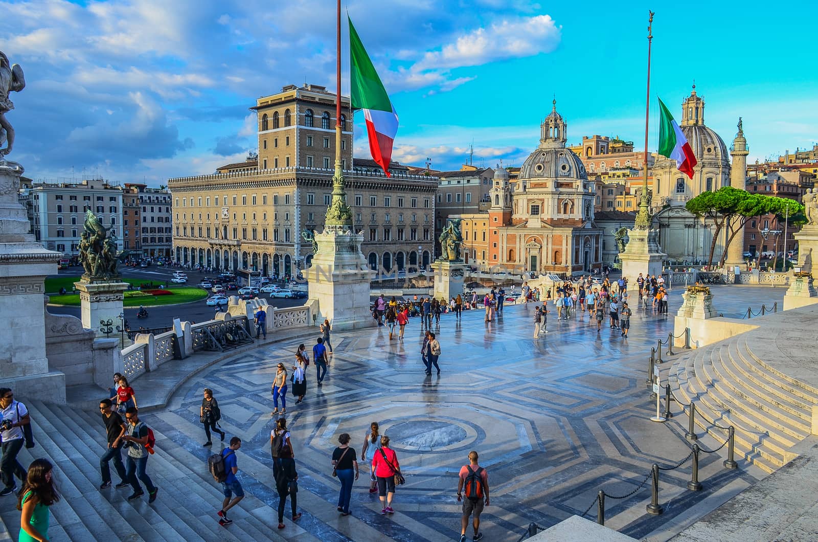 View of Italian flags and  Piazza Venezia from Vittorio Emanuele II Monument. Rome, Italy