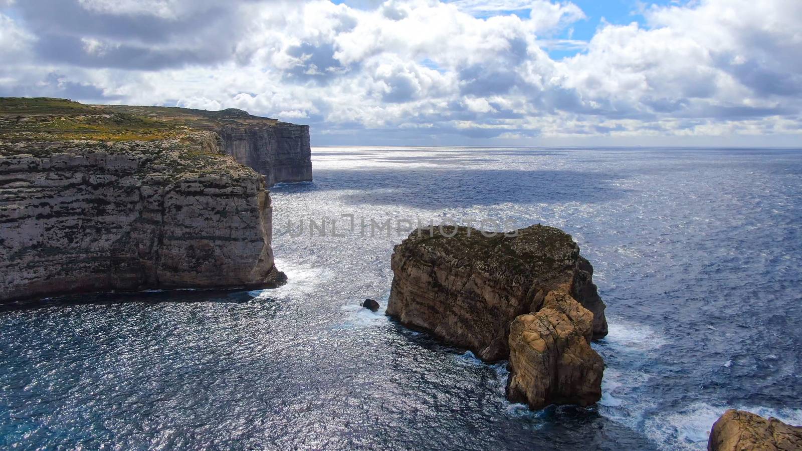 The remains of Azure Window at Dwerja Bay at the coast of Gozo Malta - aerial photography