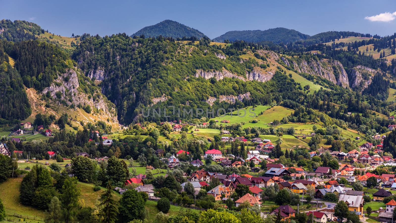 Summer alpine Transylvania landmark, landscape with green fields and valleys, high Piatra Craiului mountains, Carpathians, Transylvania, Romania, Europe