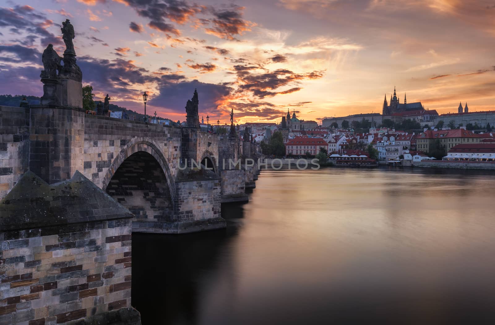 Famous iconic image of Charles bridge, Prague, Czech Republic. Concept of world travel, sightseeing and tourism.