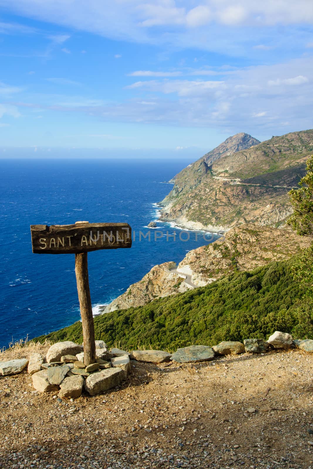 Landscape and memorial sign in Barrettali area, near road D33, in Cap Corse, Corsica, France
