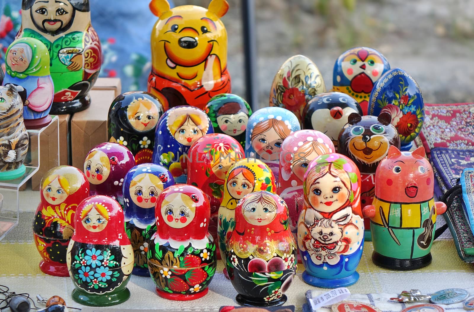 KAOHSIUNG, TAIWAN -- JANUARY 19, 2020: A street vendor sells Russian style wooden Matryoshka dolls in various colors and designs.