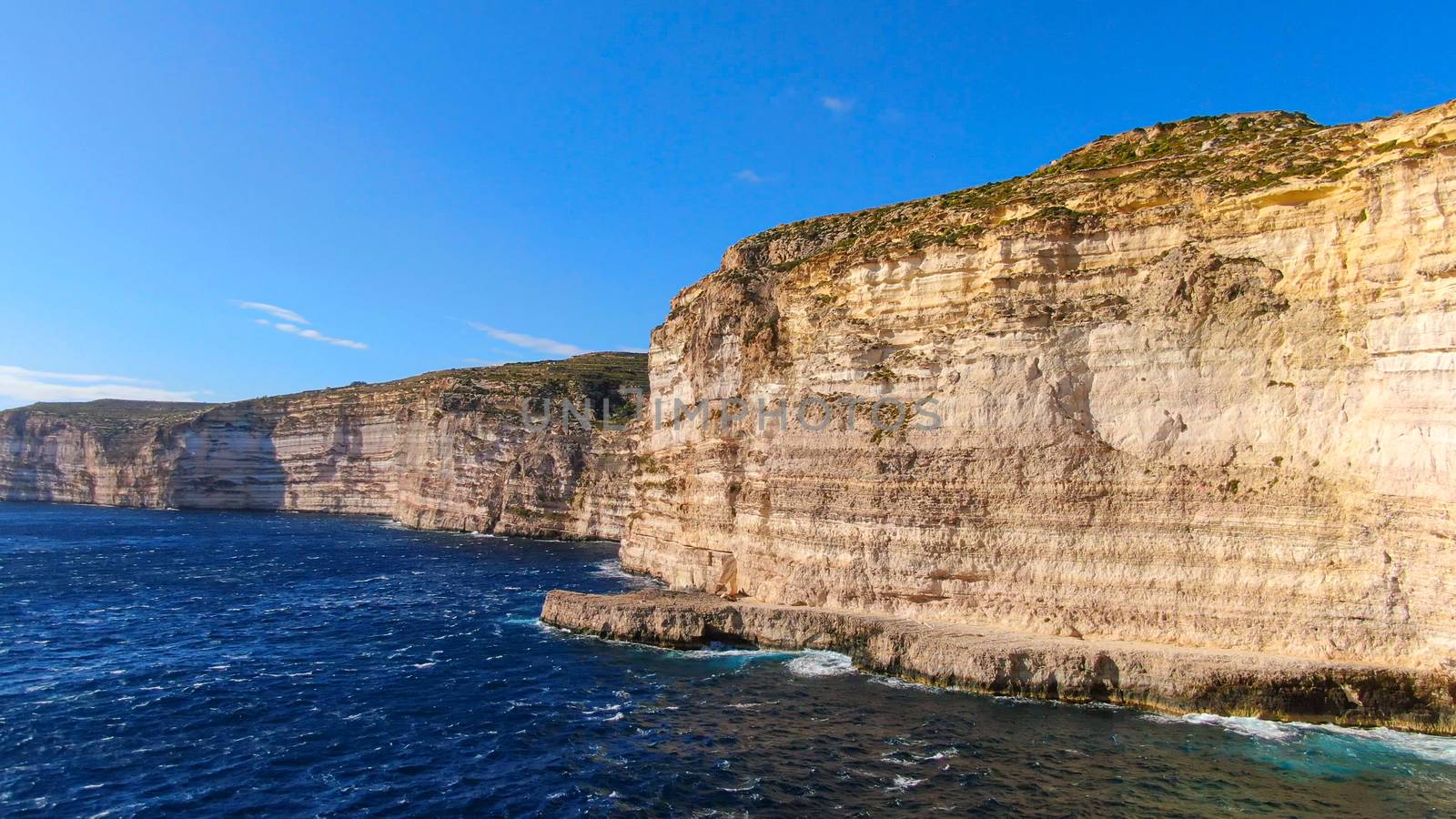 The amazing coast of Gozo - Malta with its steep cliffs by Lattwein
