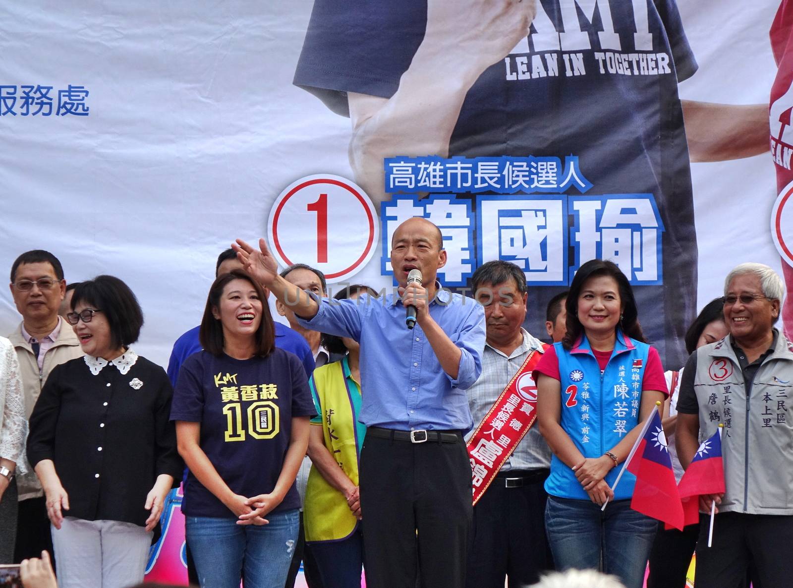 KAOHSIUNG, TAIWAN -- NOVEMBER 10, 2018: KMT Kaohsiung mayor candidate Han Guo-Yun (center, blue shirt), speaks at an election rally.