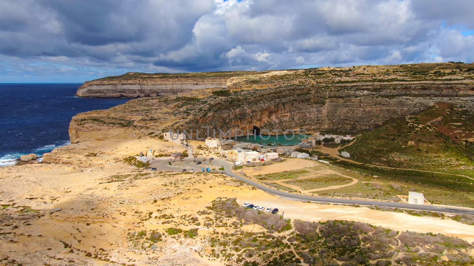 Flight over Dwerja Bay at the coast of Gozo Malta - aerial photography