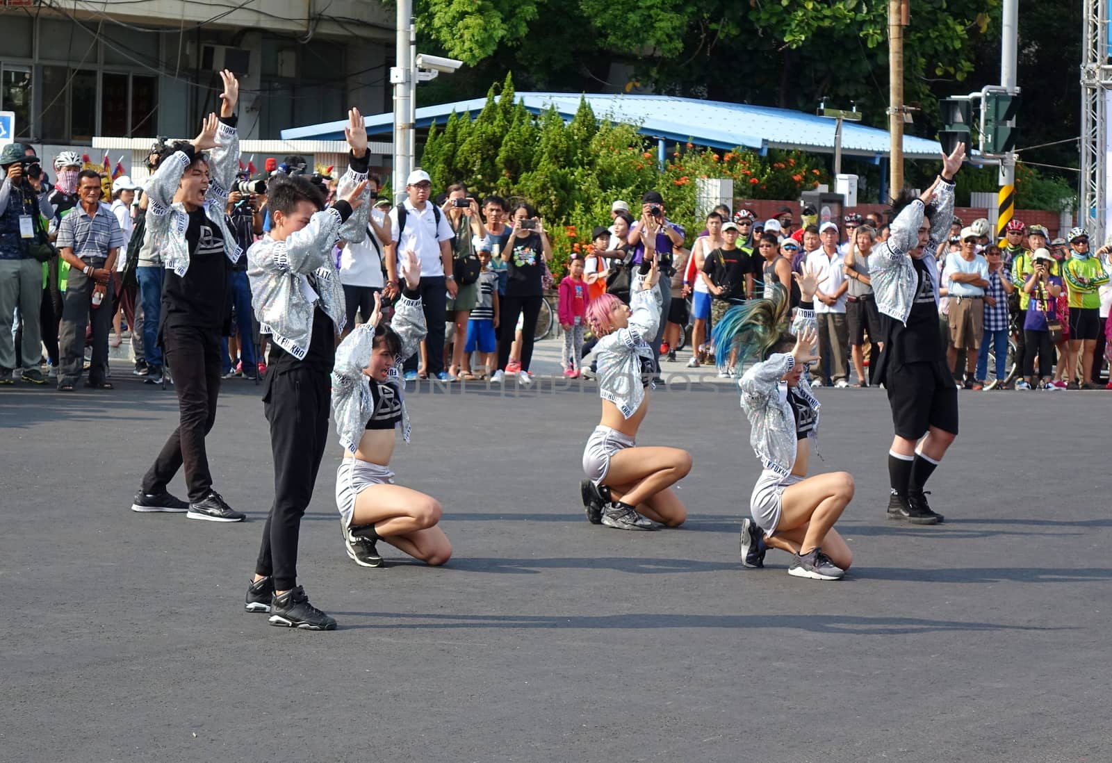 KAOHSIUNG, TAIWAN -- OCTOBER 1, 2017: Young people perform a modern dance at the opening of the 2017 Ecomobility Festival. 