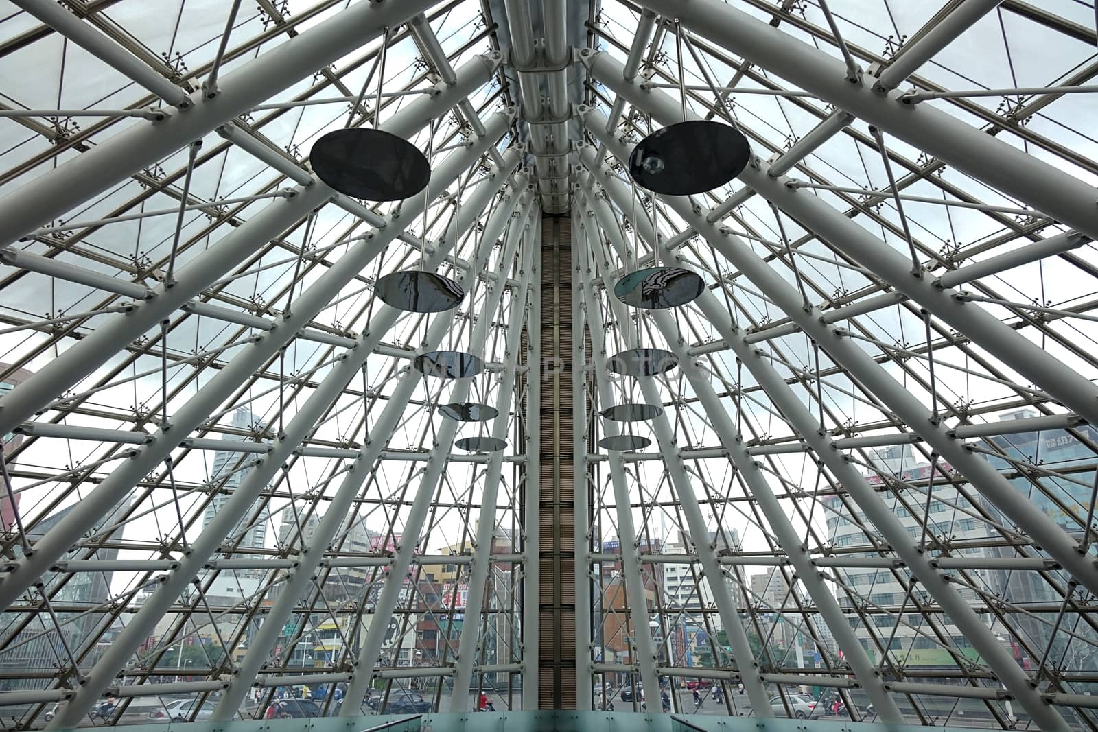 KAOHSIUNG, TAIWAN -- JUNE 26, 2014: The entrance to the Formosa Boulevard Station of the Kaohsiung City subway transportation system features a modern design with curved lines.