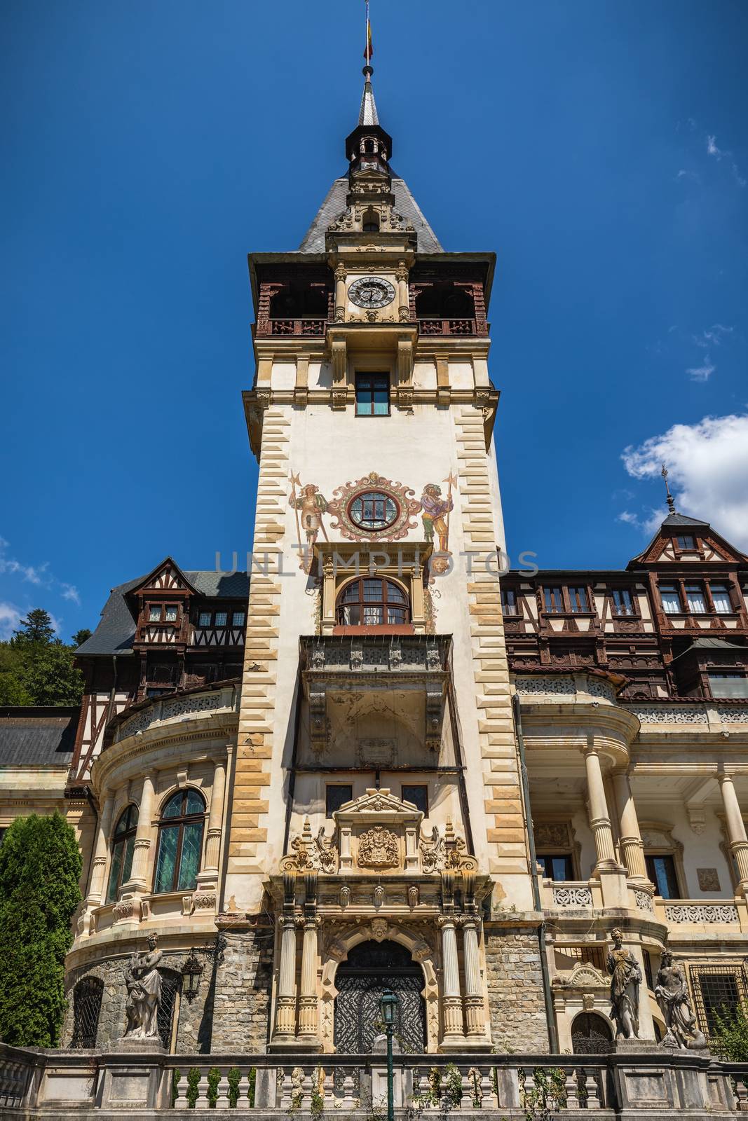 Peles Castle, Romania. Beautiful famous royal castle and ornamental garden in Sinaia landmark of Carpathian Mountains in Europe