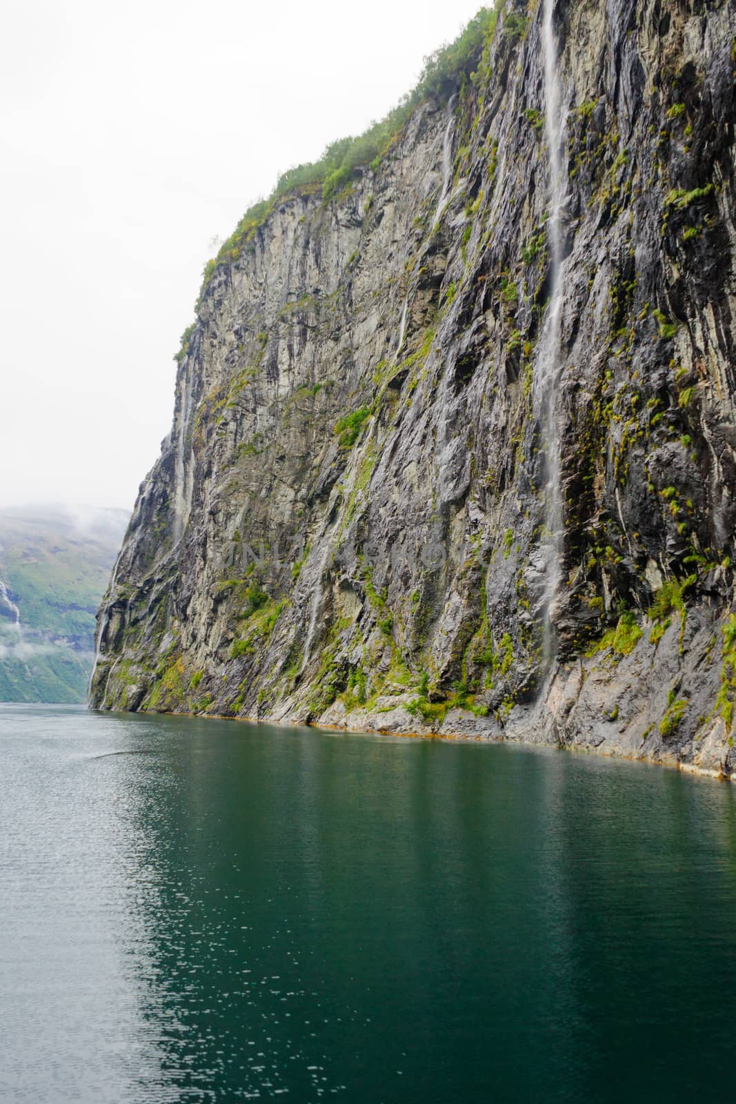 waterfall and View in the Geiranger fjord, Norway