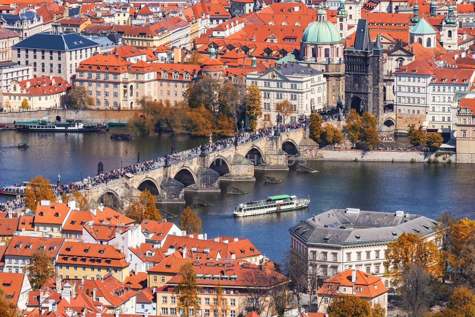 Prague, Czezh Republic. Scenic autumn aerial view of the Old Town with red foliage