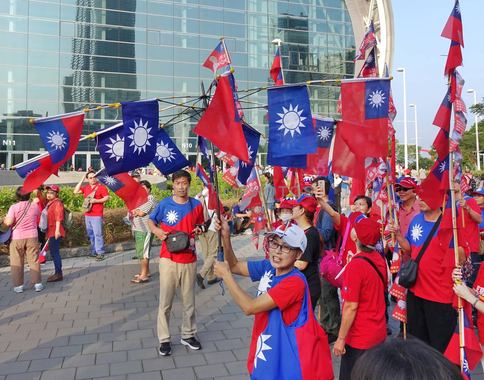 KAOHSIUNG, TAIWAN -- OCTOBER 10, 2019: An excited crowd waves national flags during the national day celebrations at a free, public event.