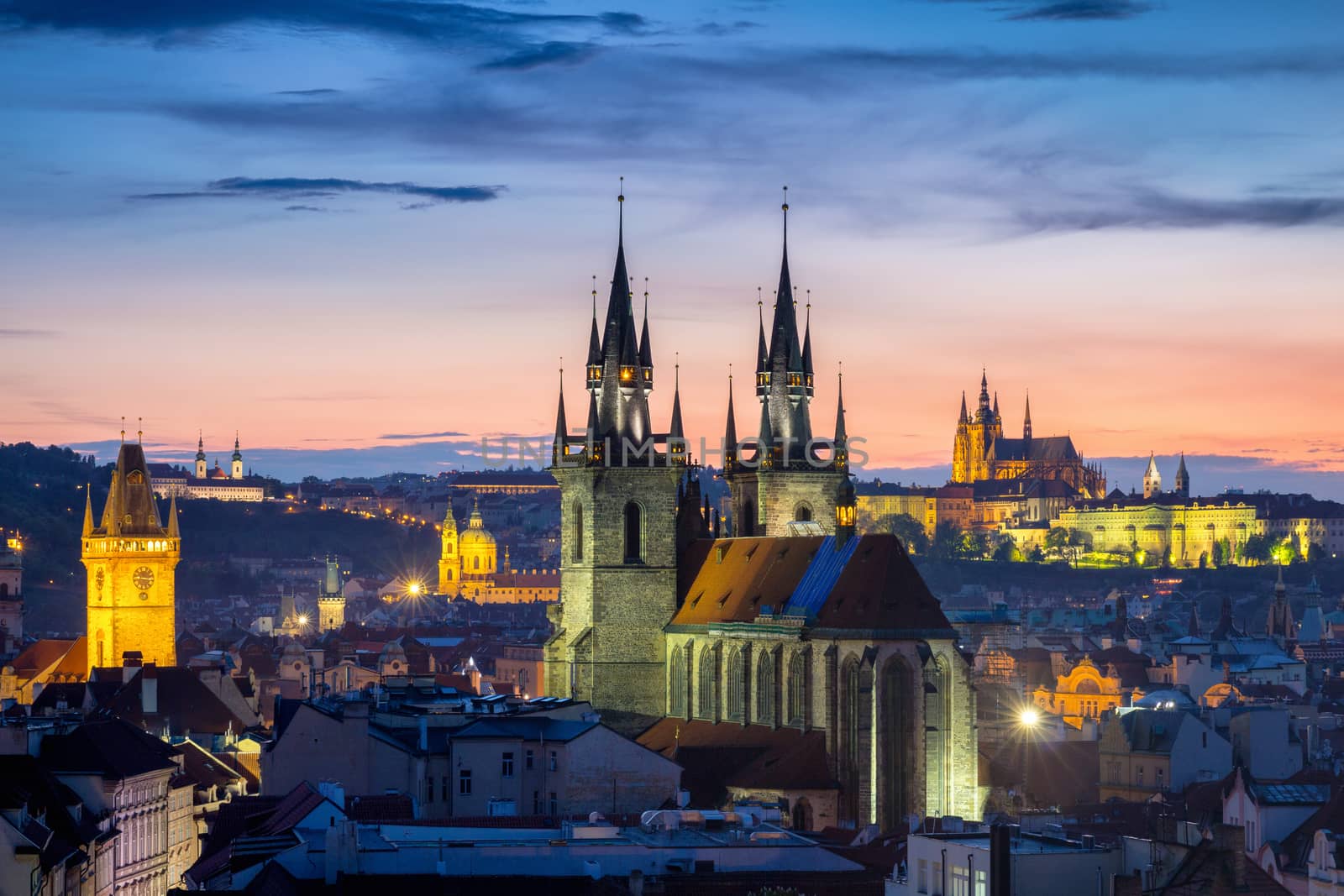 Aerial view over Church of Our Lady before Tyn, Old Town and Prague Castle at sunset in Prague, Czech Republic