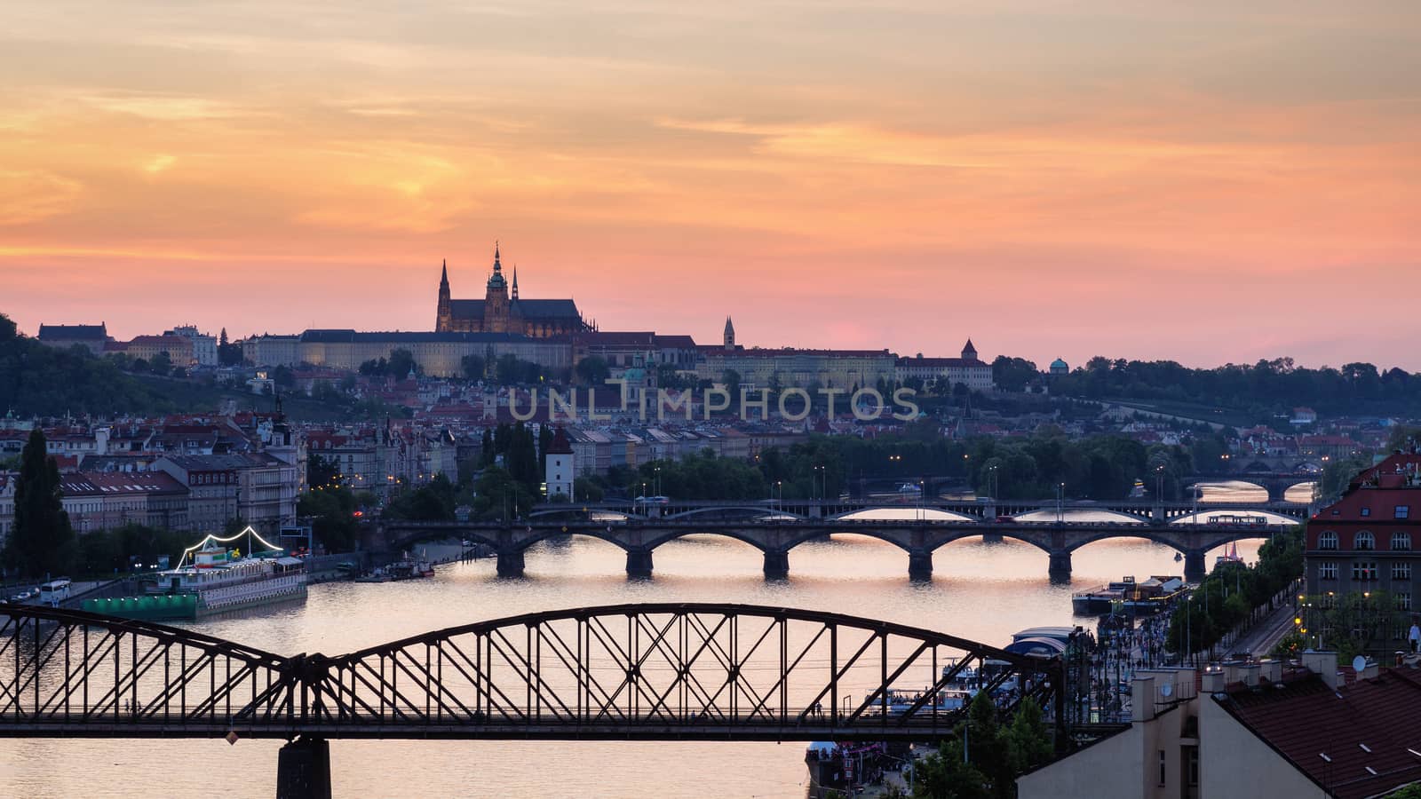Panorama of Prague with red roofs from above summer day at dusk, Czech Republic