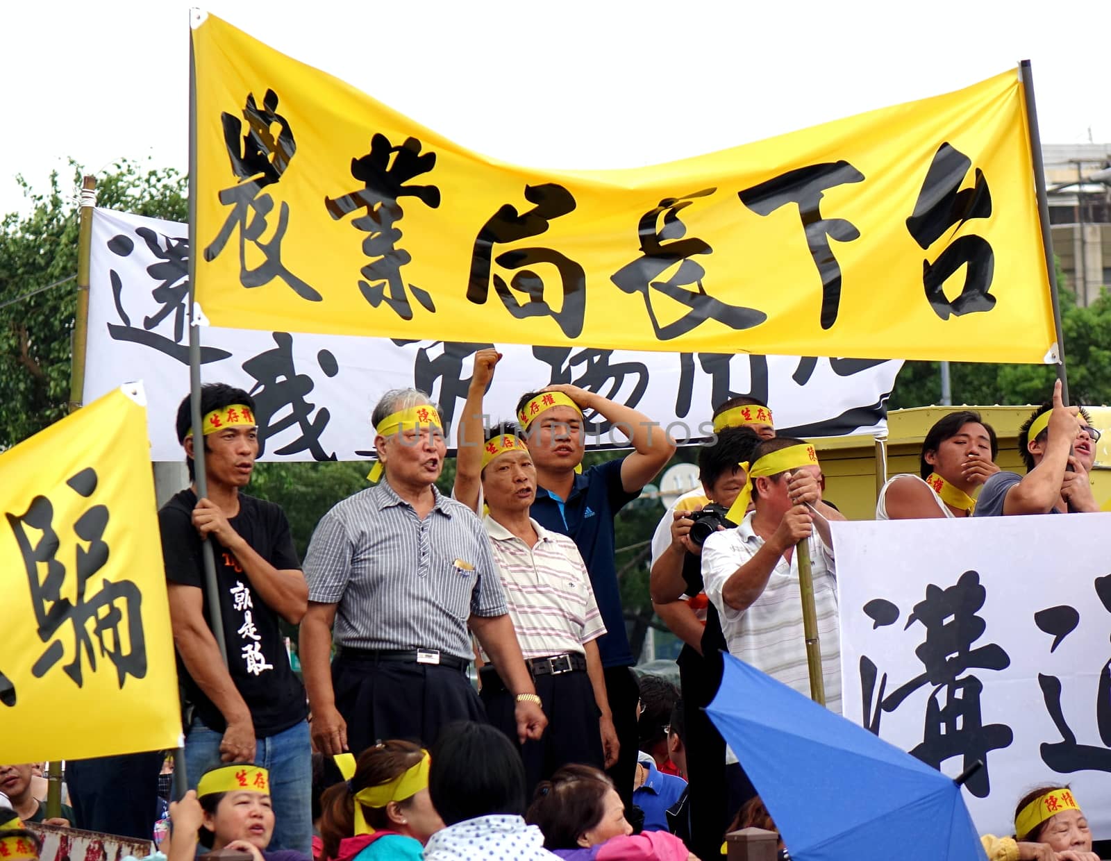 KAOHSIUNG, TAIWAN -- JULY 31 , 2017: Protesters demonstrate at the opening of a controversial new road. The construction had led to forced evictions of residents.