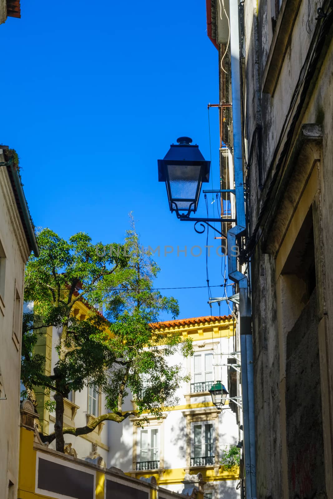 Typical old city alley and buildings, in Coimbra, Portugal