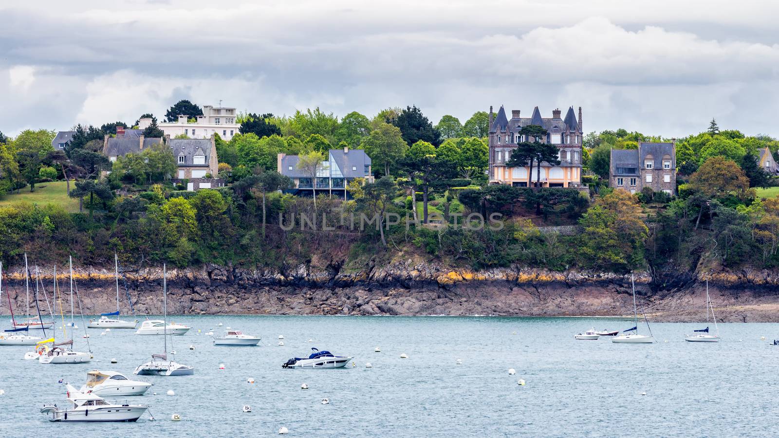 View of Dinard city with coastline full of boats. Brittany, France