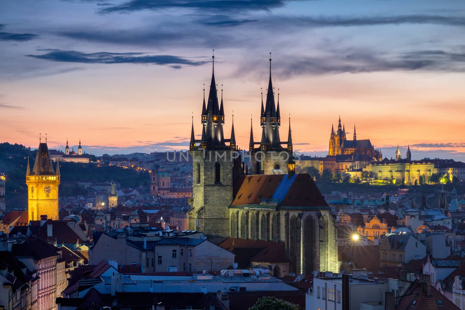 Famous Tyn Church on Old Town Square, Prague castle is visible in the background. Prague, Czech Republic