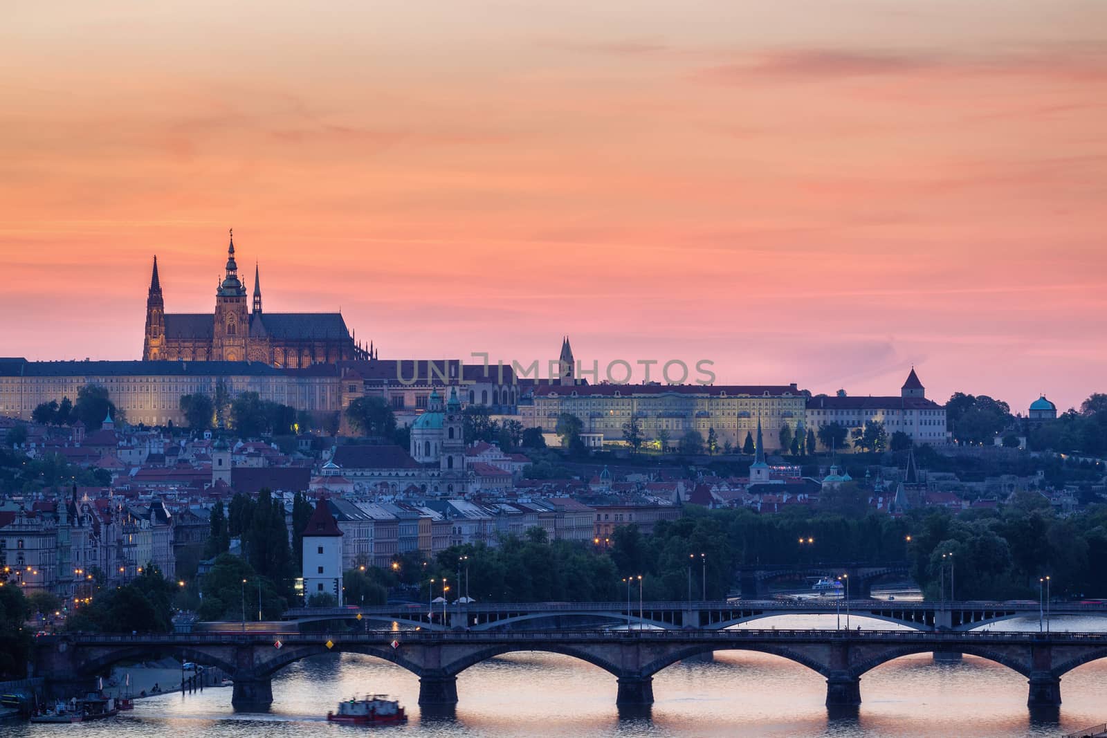 Panorama of Prague with red roofs from above summer day at dusk, Czech Republic