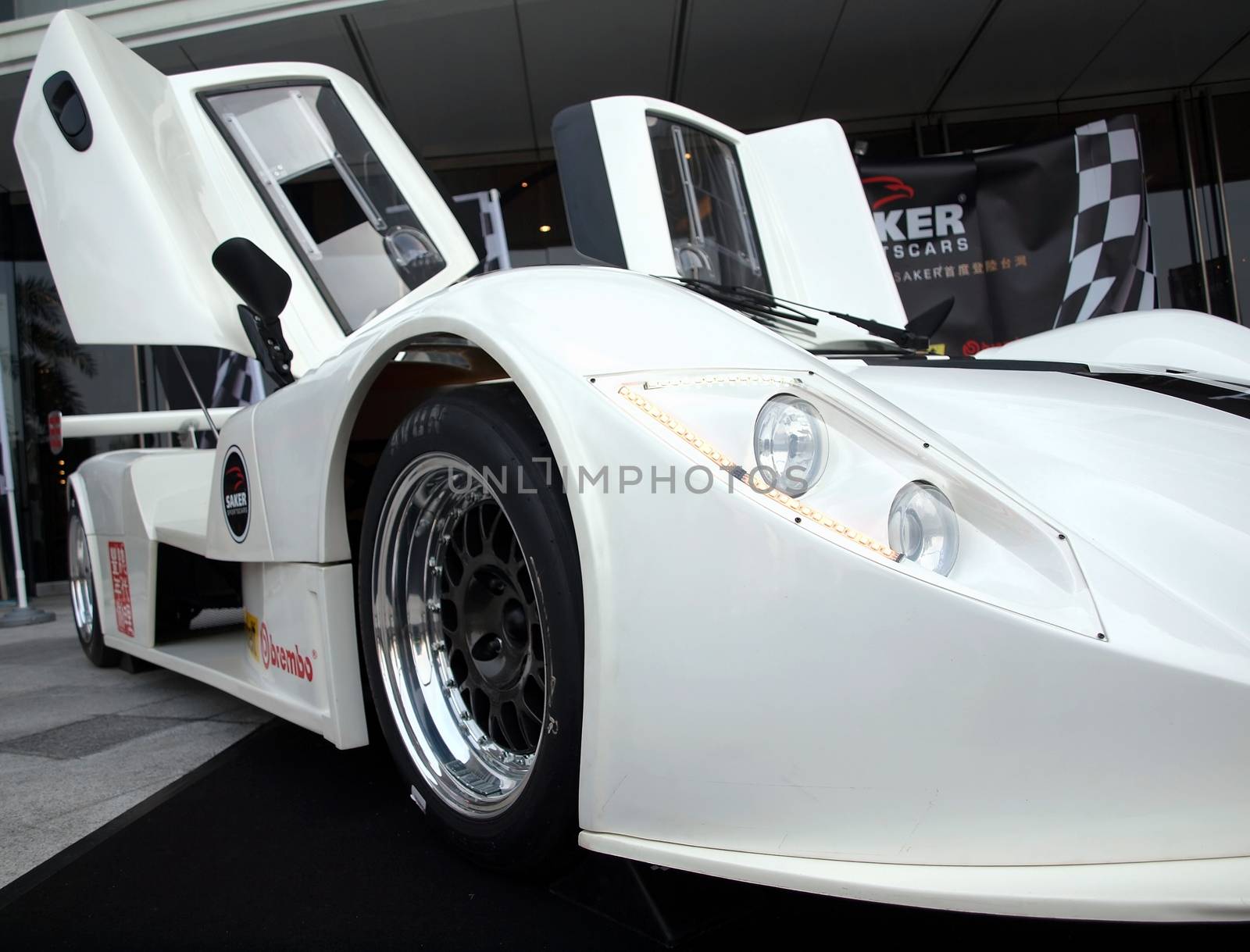 KAOHSIUNG, TAIWAN - FEBRUARY 24: To celebrate the opening of its Taiwan branch, Saker Sportscars demonstrates its RapX racing model on February 24, 2013 in Kaohsiung.