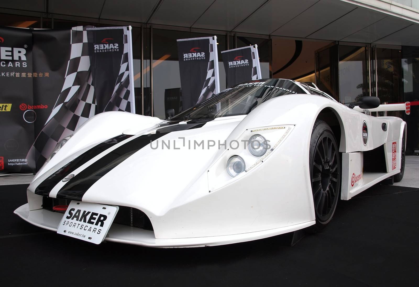 KAOHSIUNG, TAIWAN - FEBRUARY 24: To celebrate the opening of its Taiwan branch, Saker Sportscars demonstrates its RapX racing model on February 24, 2013 in Kaohsiung.