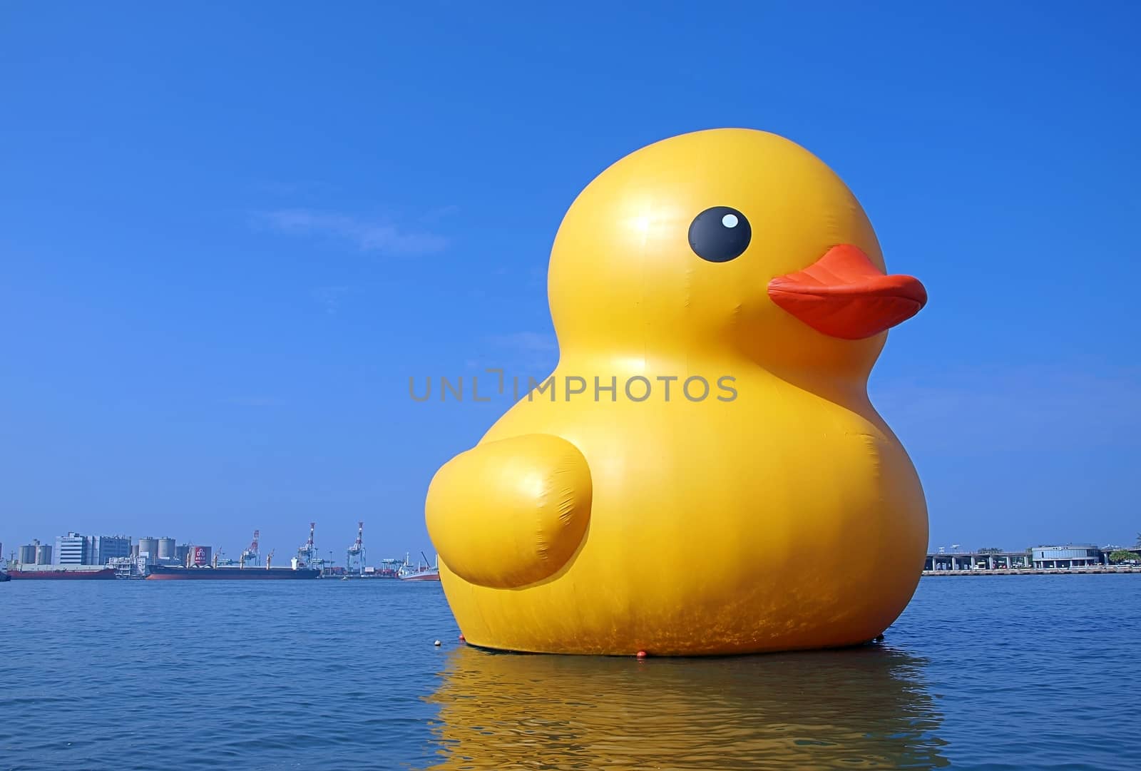 KAOHSIUNG, TAIWAN -- SEPTEMBER 29: The giant rubber duck designed by Dutch artist Hofman goes on display at the Glory Pier on September 29, 2013 in Kaohsiung