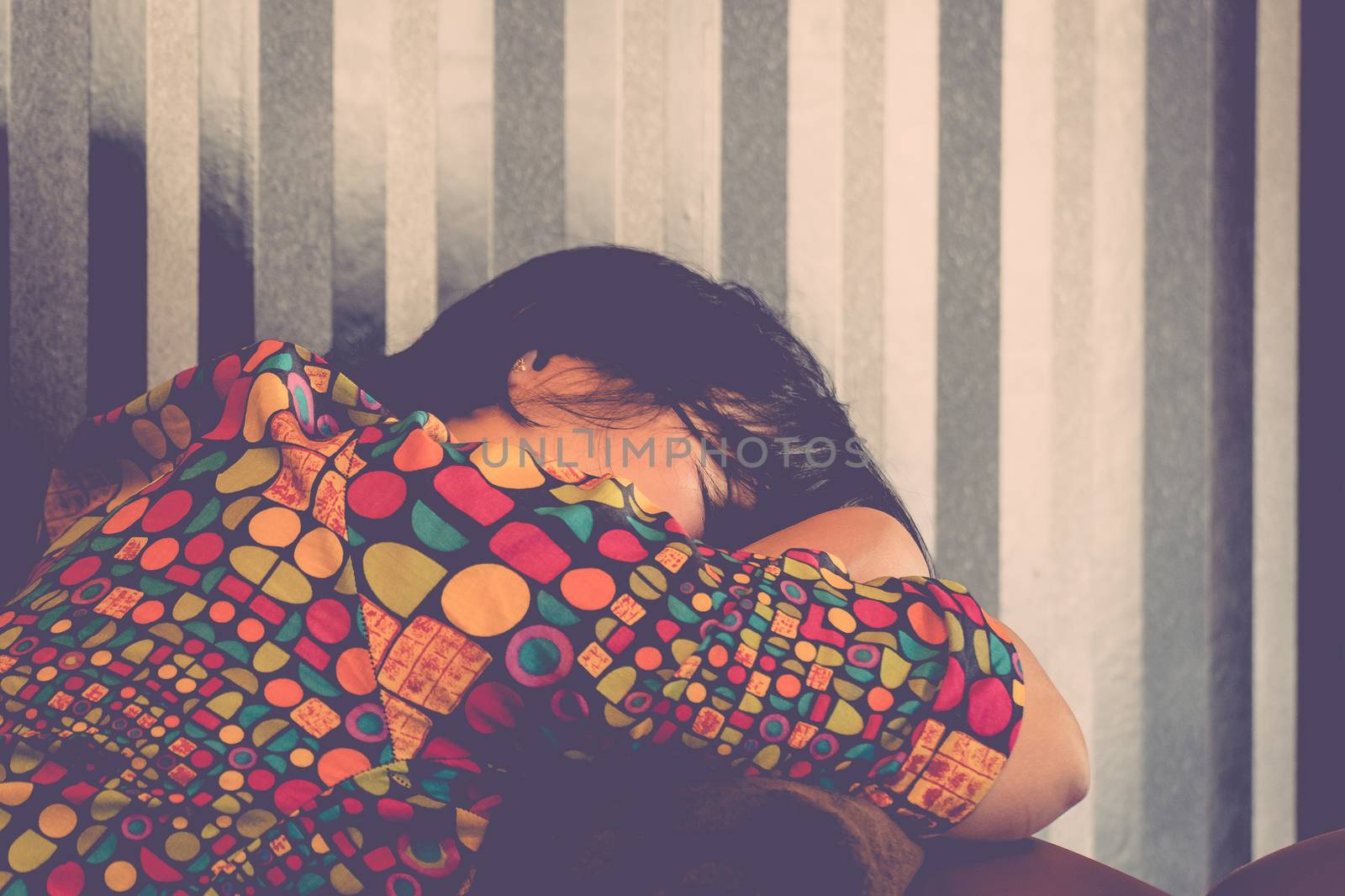 Asia woman plump body take a nap or sleep on a brown sofa Because fatigue or tired , process in vintage style