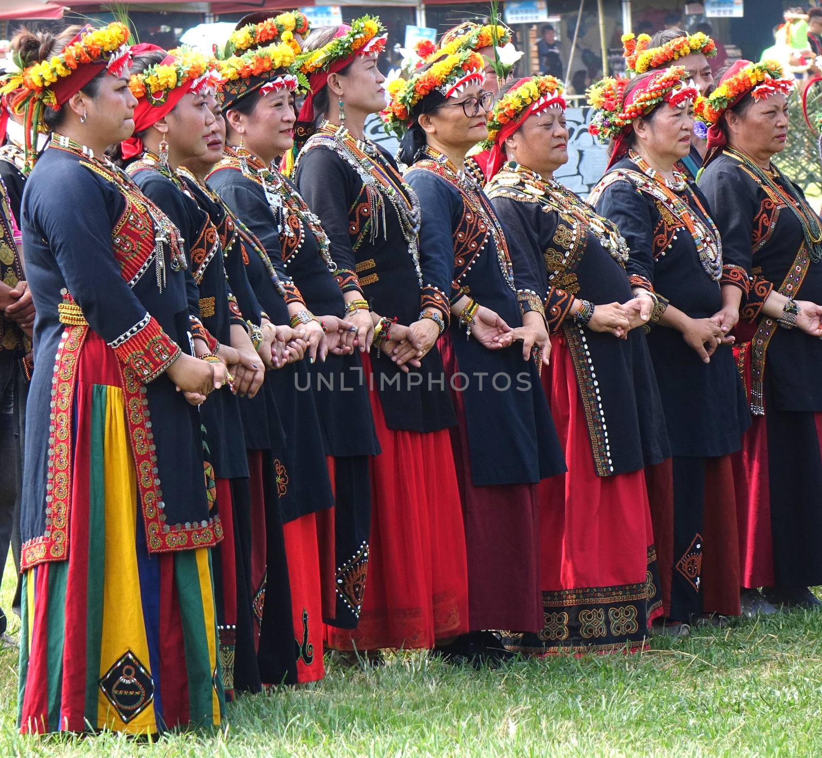 KAOHSIUNG, TAIWAN -- SEPTEMBER 28, 2019: Women of the indigenous Rukai tribe perform a dance during the traditional harvest festival.