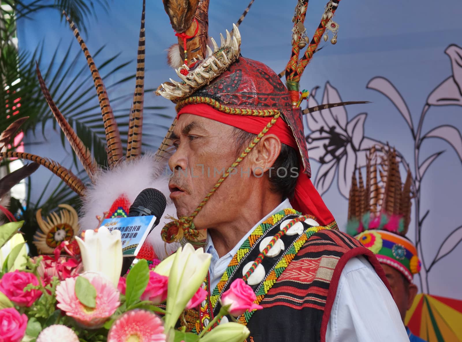 KAOHSIUNG, TAIWAN -- SEPTEMBER 28, 2019: An elders of the indigenous Rukai tribe speaks at the traditional harvest festival.
