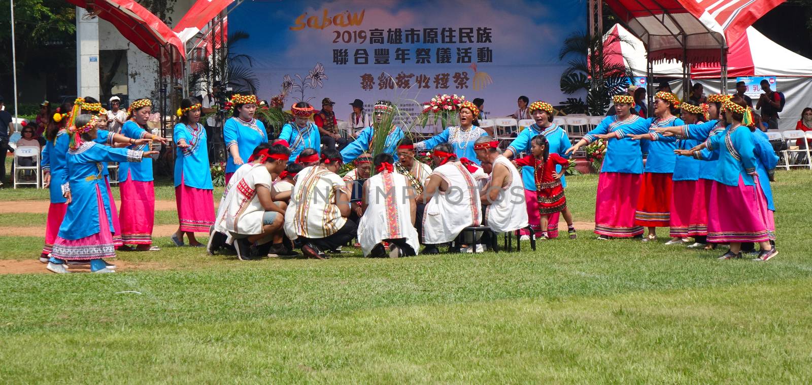 KAOHSIUNG, TAIWAN -- SEPTEMBER 28, 2019: Member of the indigenous Bunun tribe perform a traditional dance at the yearly harvest festival.
