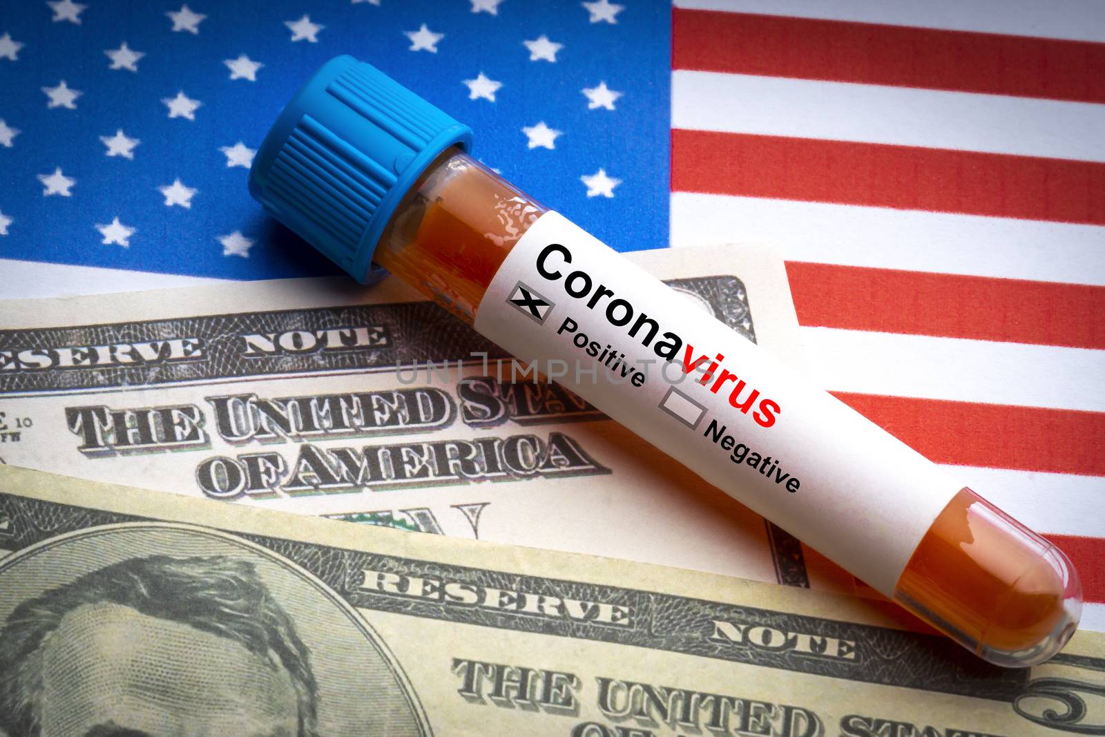 CORONAVIRUS COVID-19 text, US Dollar and blood sample vacuum tube on America flags background by silverwings