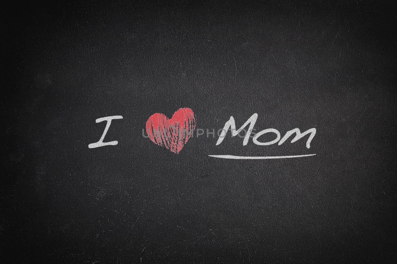 Blackboard with phrase, I love mom.