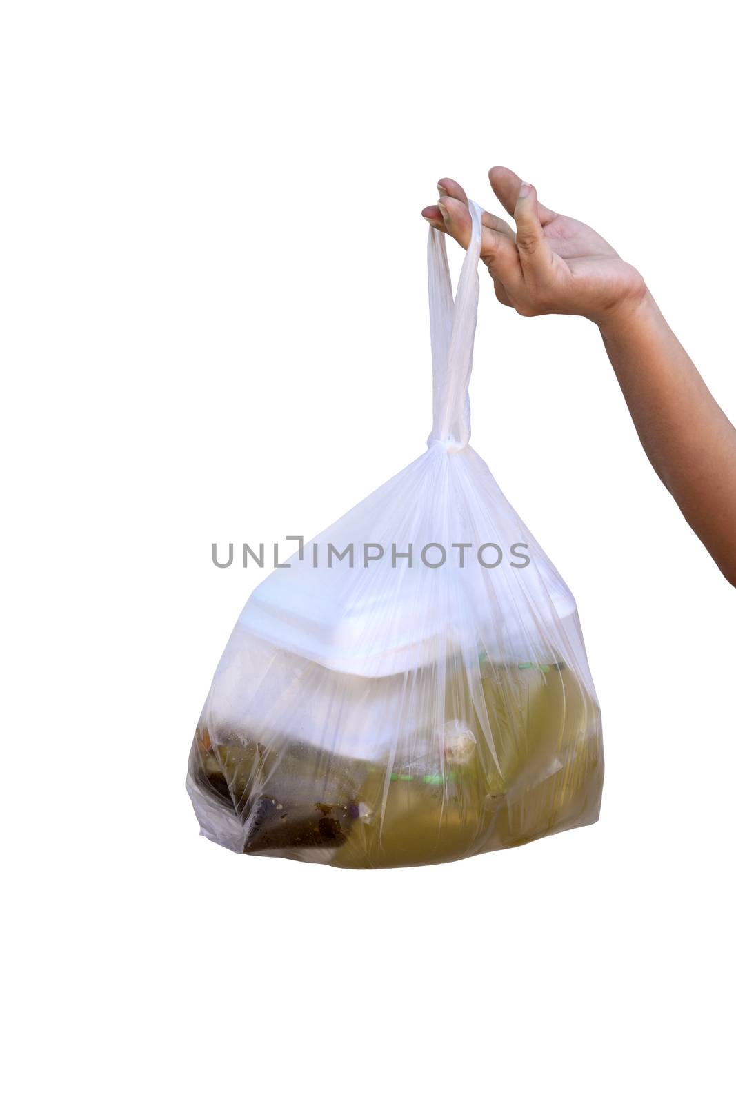A woman's hand is holding a plastic bag to hold food