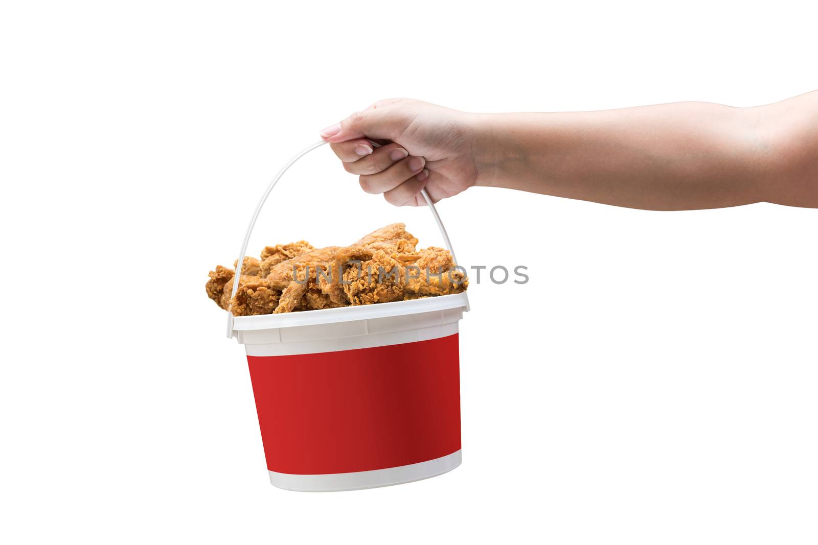 A hand holding a bucket of crispy fried chicken on a white background