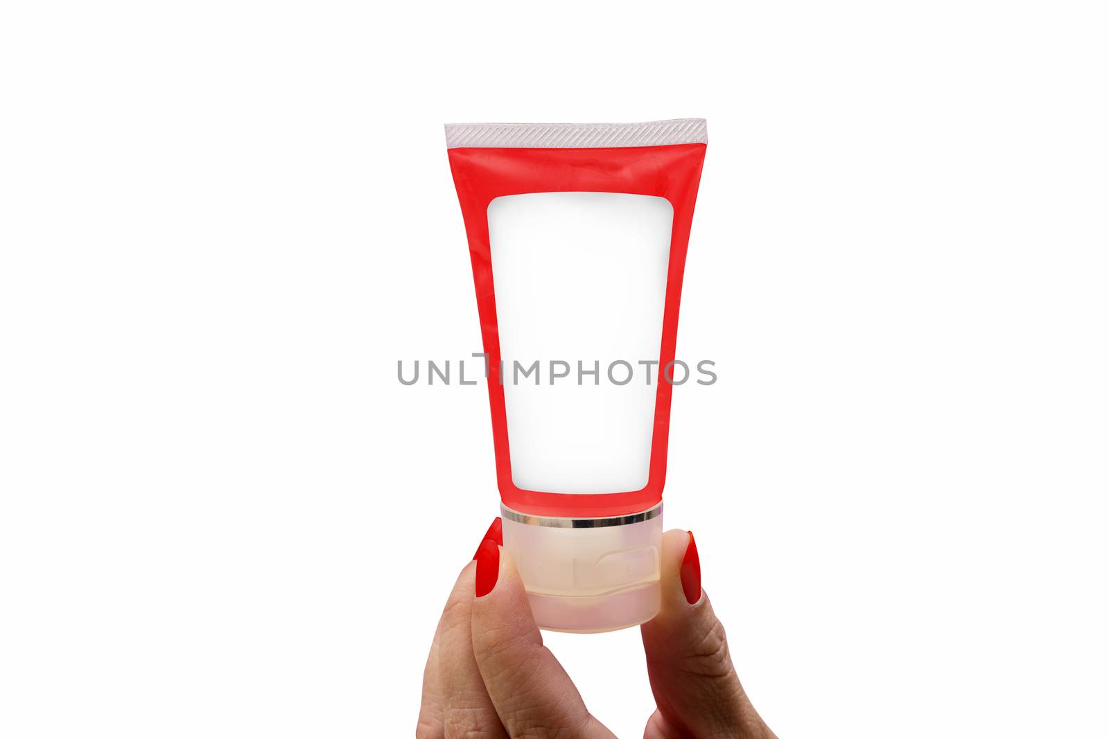 The woman's hand holding a red gel tube on a white background