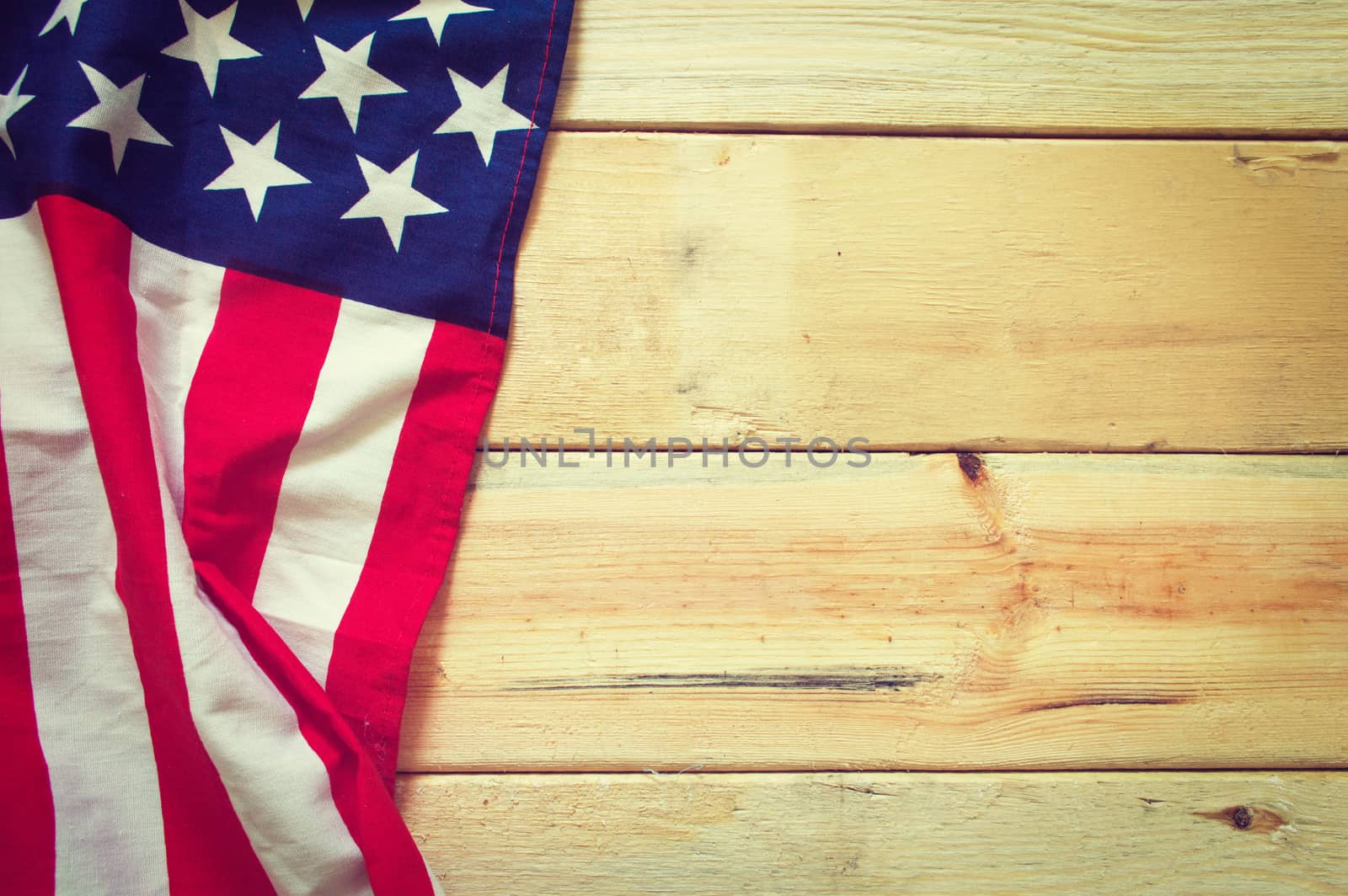  American flag on wooden background retro effect image