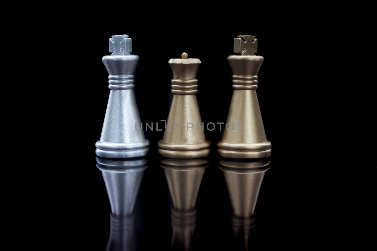 Stacking Piece of chess, king and queen with reflection glass on black background. by silverwings