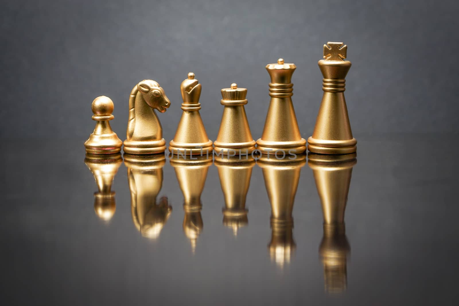 Stacking Piece of chess, king, queen, knight, castle, bishop and  pawn or apieces with reflection glass on black background by silverwings