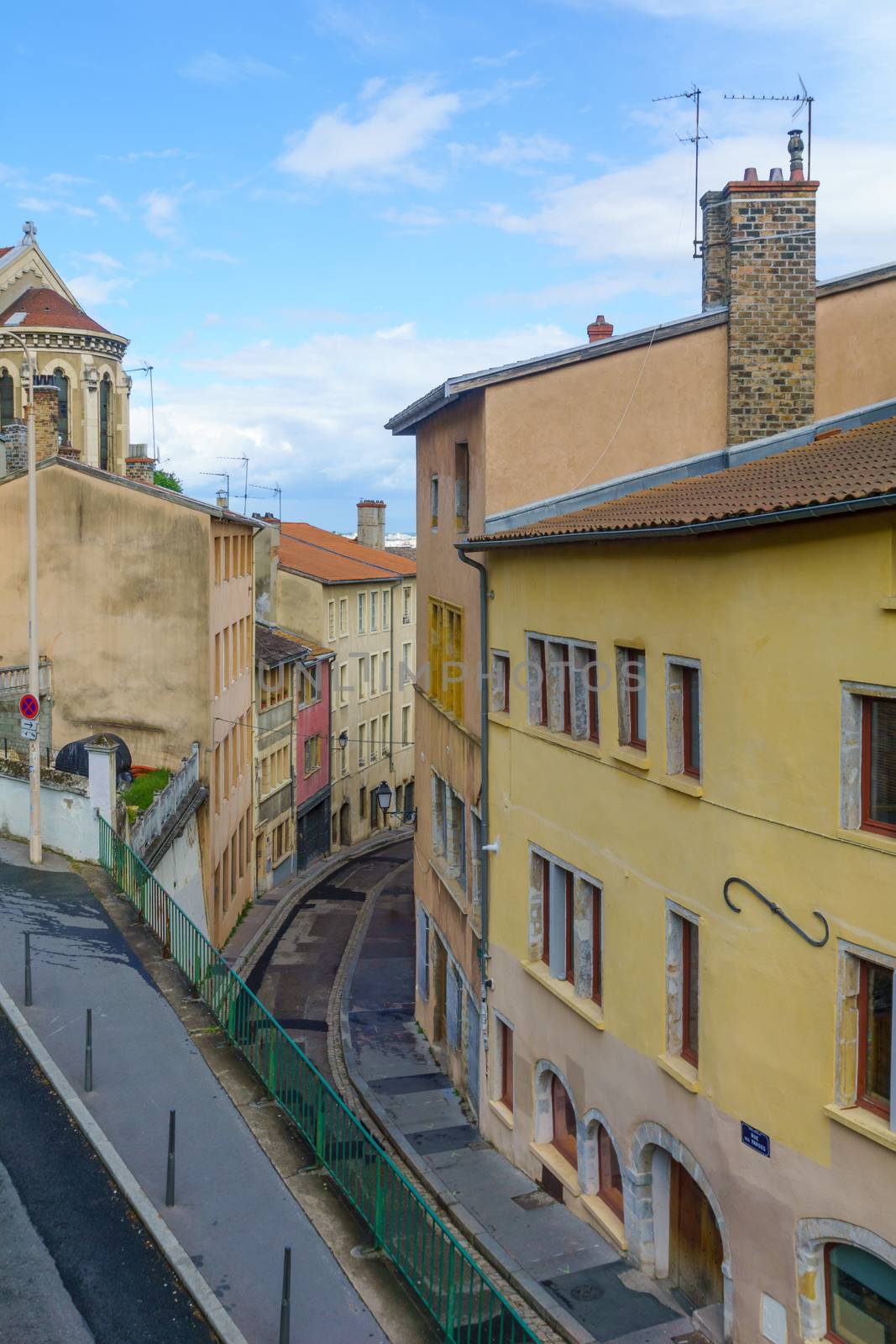 View of a winding alley in the old city of Lyon, France