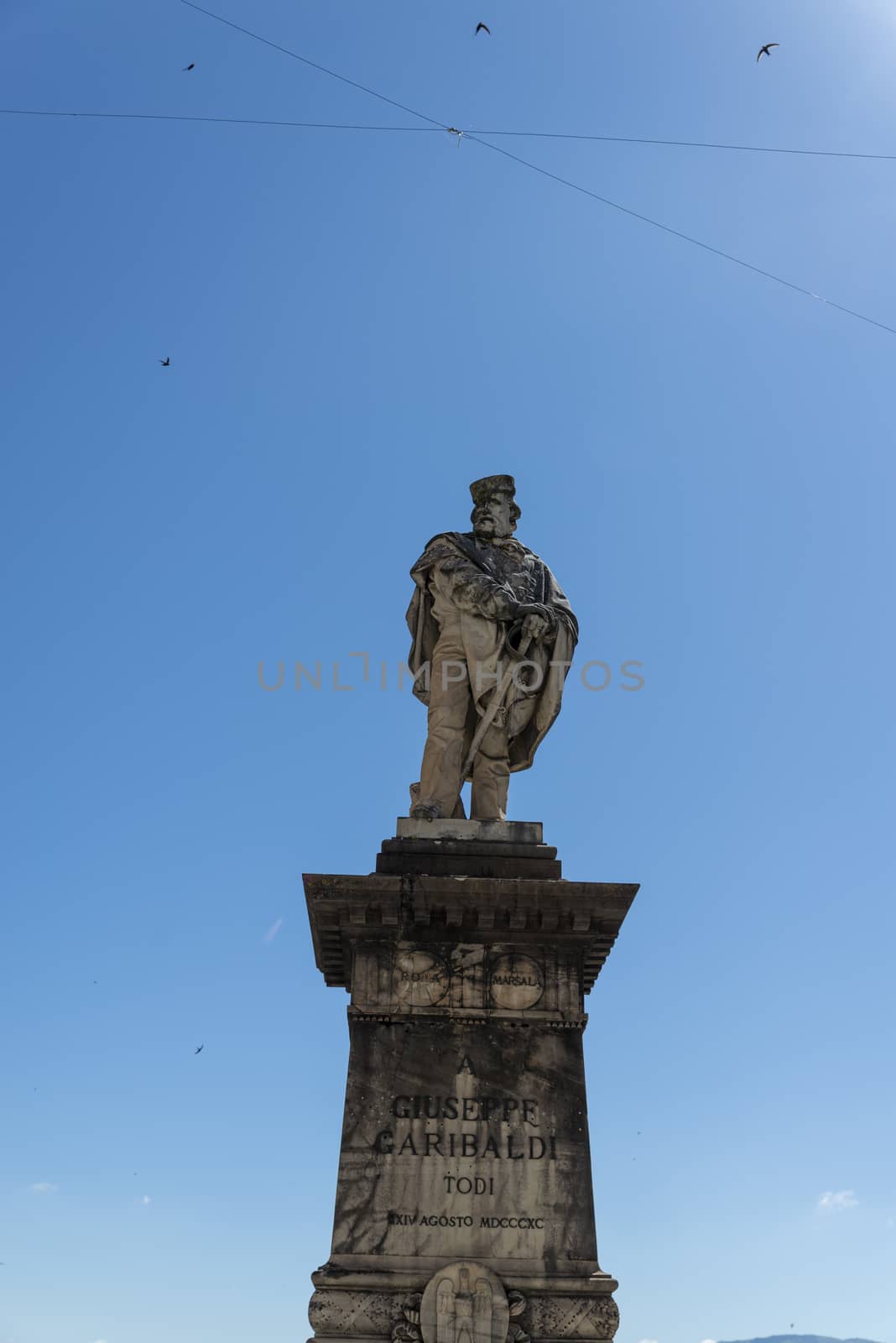 todi,italy june 20 2020 :Garibaldi monument in the center of the Garibaldi square in Todi