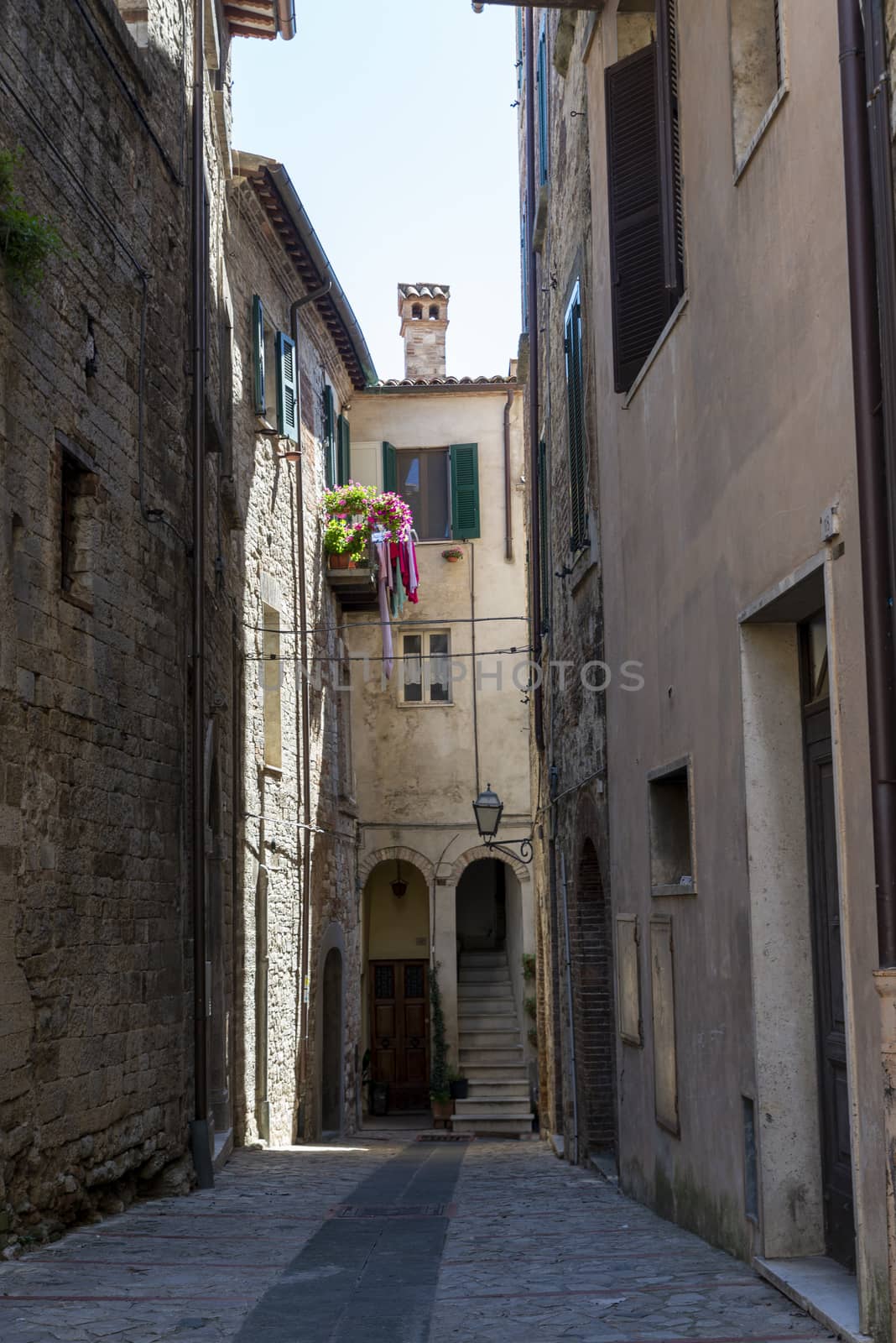 todi,italy june 20 2020 :architecture of the buildings in the village of todi between churches and glimpses of streets