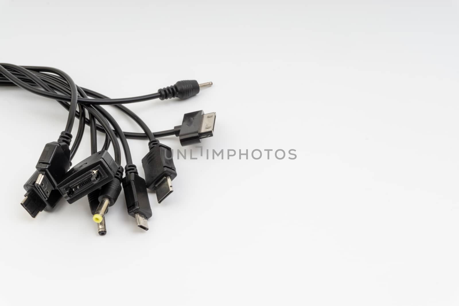 Universal recharger head or usb cable isolated on white background by silverwings