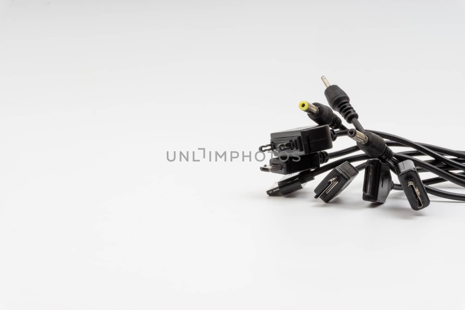 Universal recharger head or usb cable isolated on white background by silverwings