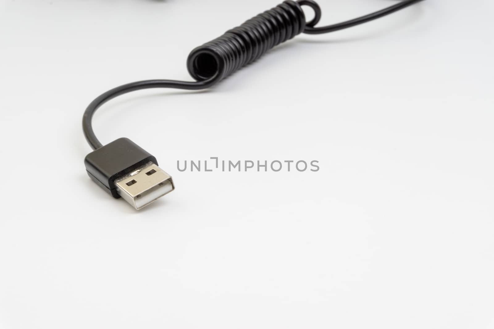 Universal recharger head or usb cable isolated on white background by silverwings